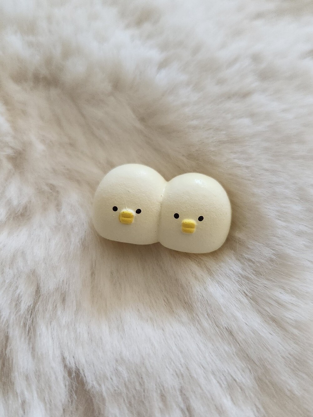 Twin yellow baby chicken figure